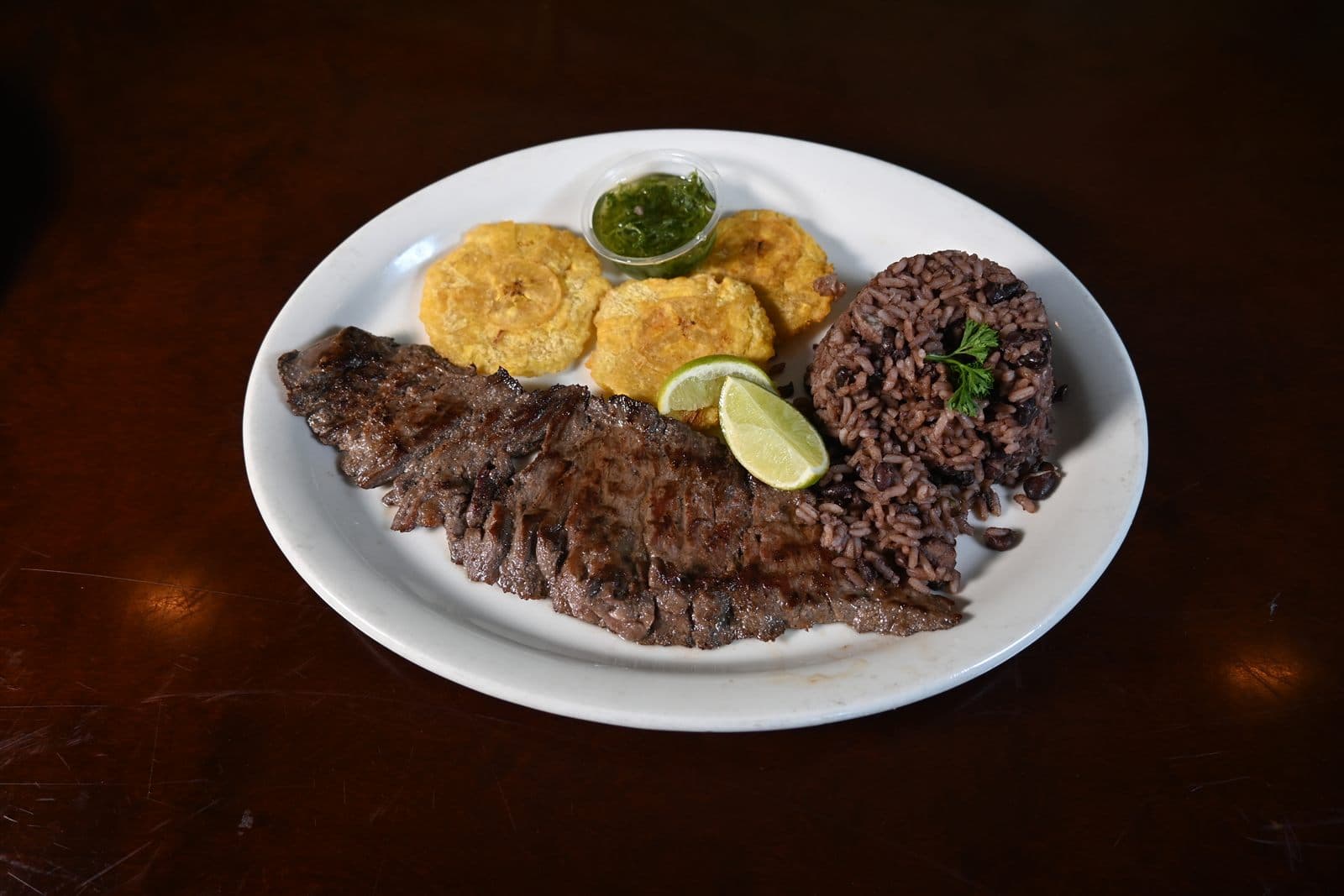 Palomilla steak with tostones and black beans